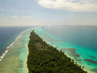 Aerial spherical panorama of tropical paradise beach on tiny Maldives island Dhigurah in the Ari Atoll. Turquoise ocean, white sand, coconut palm trees.