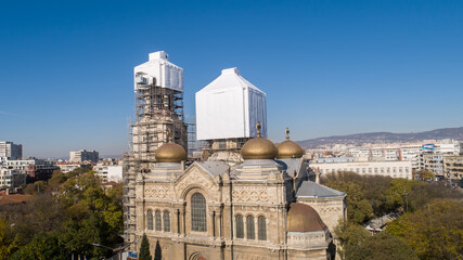 Fototapeta na wymiar Restoration process of church, cathedral, maintenance and gold plating of its domes. The Cathedral of the Assumption in Varna, Bulgaria.