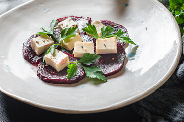 beet salad vegetables cheese feta, beetroot second course aperitif snack ready to eat on the table...