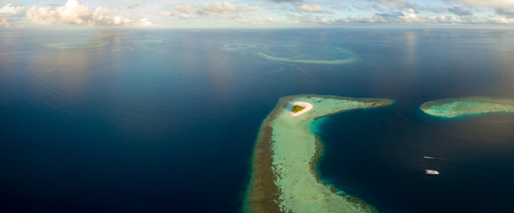 Aerial spherical panorama of tropical paradise beach on tiny Maldives island. Turquoise ocean,...