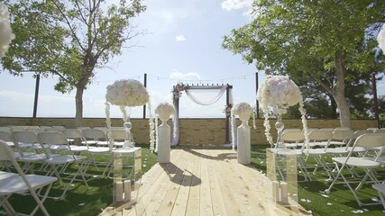 WS Outdoor wedding venue with decorations and seats