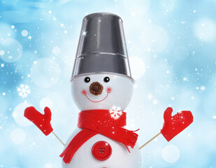 Cute decorative snowman on light blue background with snowflakes, bokeh effect
