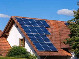 Generic house (modified by image editing) with photovoltaic system
