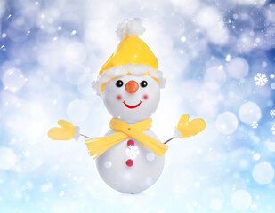 Cute decorative snowman on light blue background with snowflakes, bokeh effect