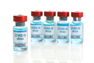 Covid 19 vaccine. Medical ampoules and syringe isolated on white background