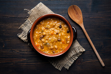 organic and vegetarian soup with legumes, vegetables and cereals