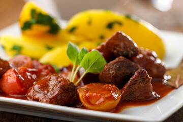 greek stifado meat stew with potatoes