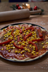 Closeup of homemade pizza with christmas decoration