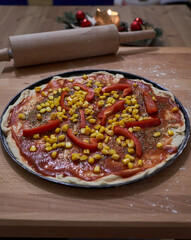 Closeup of homemade pizza with christmas decoration