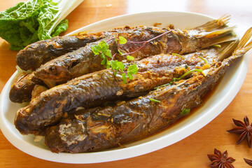 Chinese Braised Fish close up. Longnose gudgeon, Chinese lizard gudgeon.