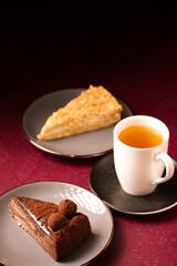 delicious cakes with a cup of tea