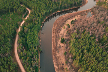look view from above drone shot aerial river Gauja Latvia forest woods gravel road reflection country turns Latvia’s State Forests