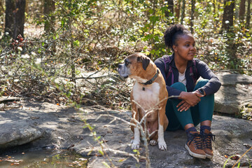 Portrait of black female hiker trekking