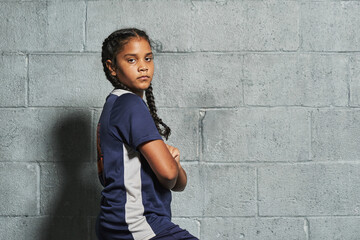 Studio soccer portrait young girl