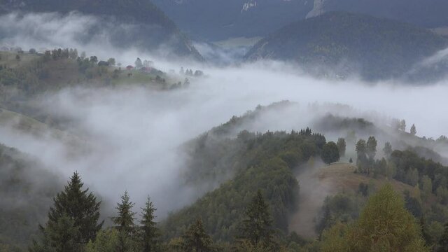 Fog passing over mountain peak, gorgeous nature landscape