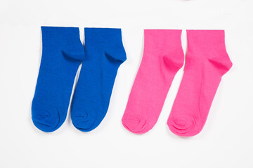 Close-up of socks hanging over white background