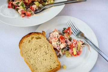 Traditional Greek salad from Folegandros with vegetables and local cheese