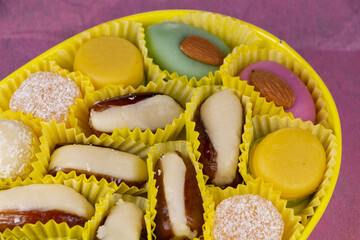 Almond paste candies and dates as gift for Christmas