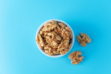raw dried healthy walnuts nuts on a background