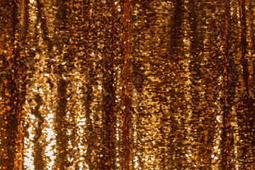 Gold background made of sequins, the trend of 2021