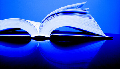 Books Open on Desk Top for Reading or Studying