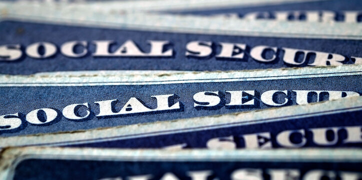 Social Security Cards in a Row Pile for Retirement