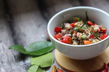 Sambal Jeruk Nipis Or Spicy Lime Sauce with ingredients, Lime, Red Chilies, Green Chilies, garlic, and salt. 