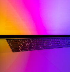 Inside MacBook illuminated with gradient view from edge