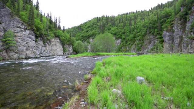 Flowing river in remote Alaska, wide