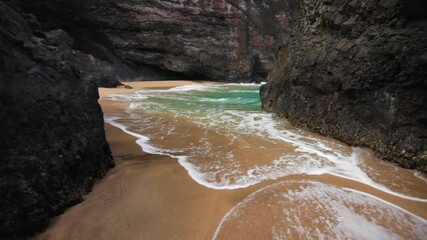 Walking on remote beach in Kauai, wide