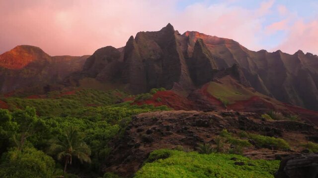 Wide, sunset over Kauai mountains in Hawaii