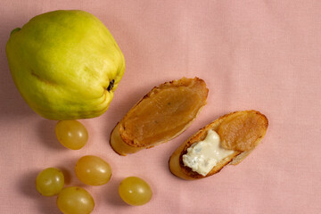 homemade quince jam. slices of bread with cheese and quince jam.