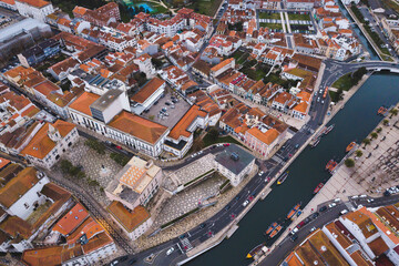 Naklejka premium drone shot aerial view from above look Aveiro Portugal cloudy day city center rooftops orange red 