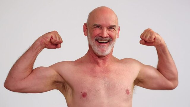Shirtless man flexing muscles