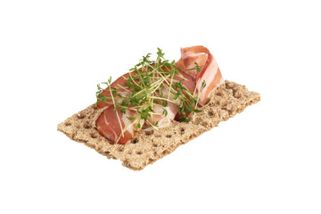 Variety of mini sandwiches with cream cheese, vegetables and salami.
