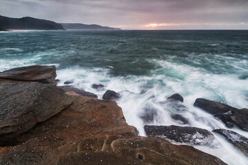 Stormy morning on the rocks in Bouddi National Park on the NSW Central Coast
