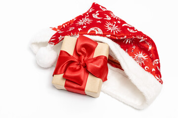 Gift with red ribbon and santa hat