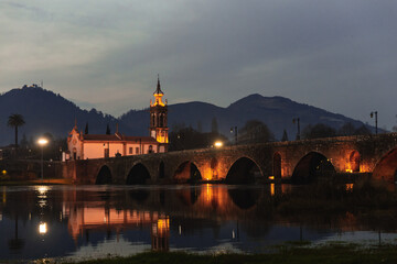Obraz premium Ponte de Lima Limia Portuga evening hill mountains city village Ponte Romana Igreja de Santo António da Torre Velha