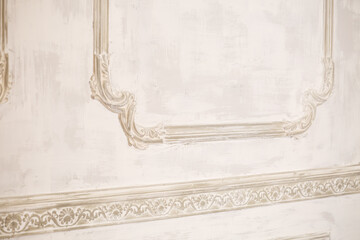 Beautiful plaster wall decor. Plaster decorations on the wall during renovation.