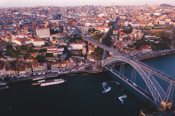 Porto Portugal Douru river coast day sunlight sunshine blue sky boats Ponte Dom Luís I look from above aerial drone shot sunset violet 