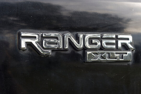 Ford Ranger emblem at the side of an old ford truck