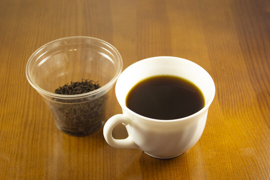 Cup of black coffee - Powered by Adobe
