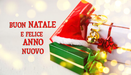 Merry Christmas and happy  New Year in italian language holidays card, presents box and gift in the color of the Italian flag background
