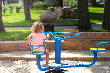 girl , playground, carousel © O.PASH
