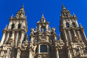 Fototapeta premium Santjago de Kompostela Spain Catedral de Santiago de Compostela blue sky sunny day sunlight shadows building church