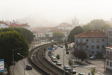 Viana do Castelo Portugal view over the city red orange roofs rooftops hill mountain railway tracks...