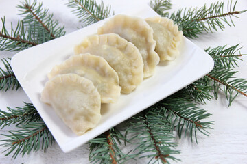 Dumplings with mushrooms and cabbage - traditional Polish Christmas Eve dish