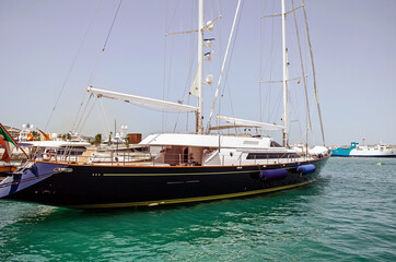 Fototapeta na wymiar Luxurious yachts in the port of Ibiza, Spain