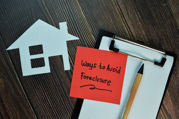 Ways to Avoid Foreclosure write on sticky notes isolated on Wooden Table. - obrazy, fototapety, plakaty