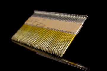 Set of construction nails isolated on the black